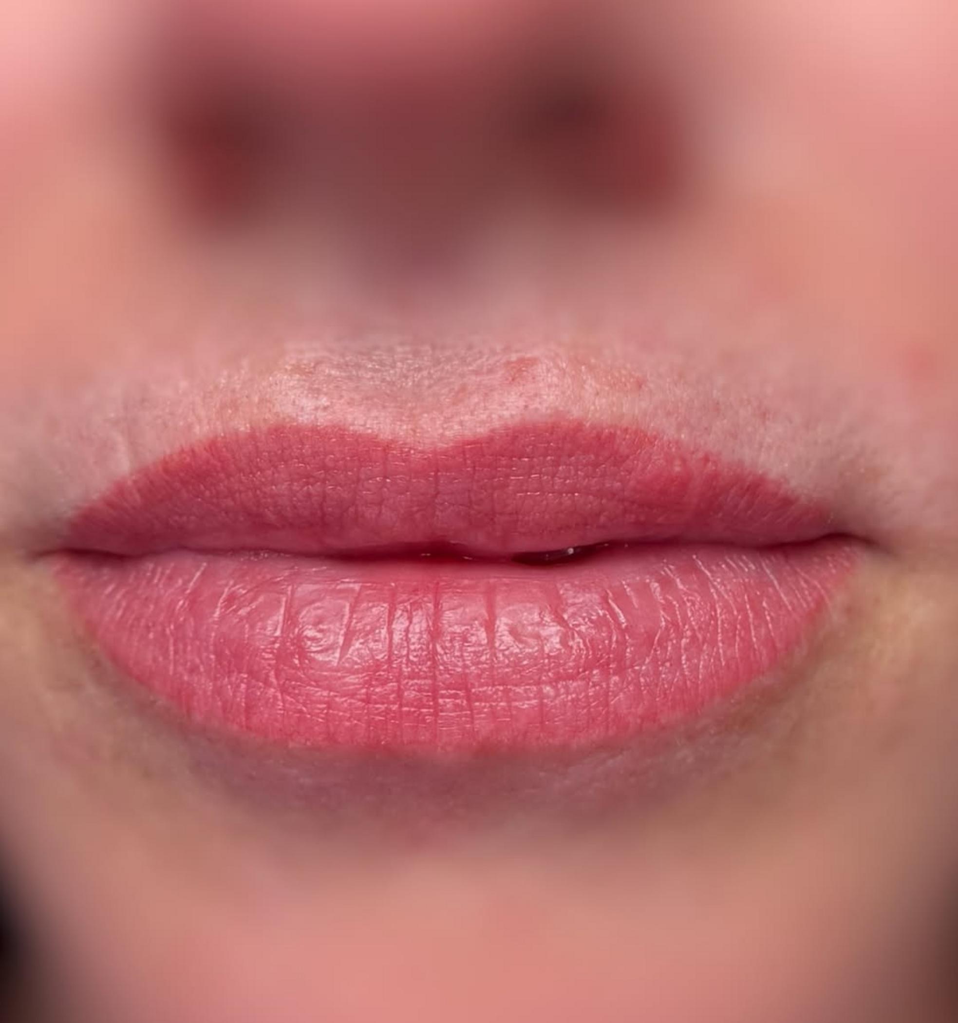 close up blurred lip tattoo edges