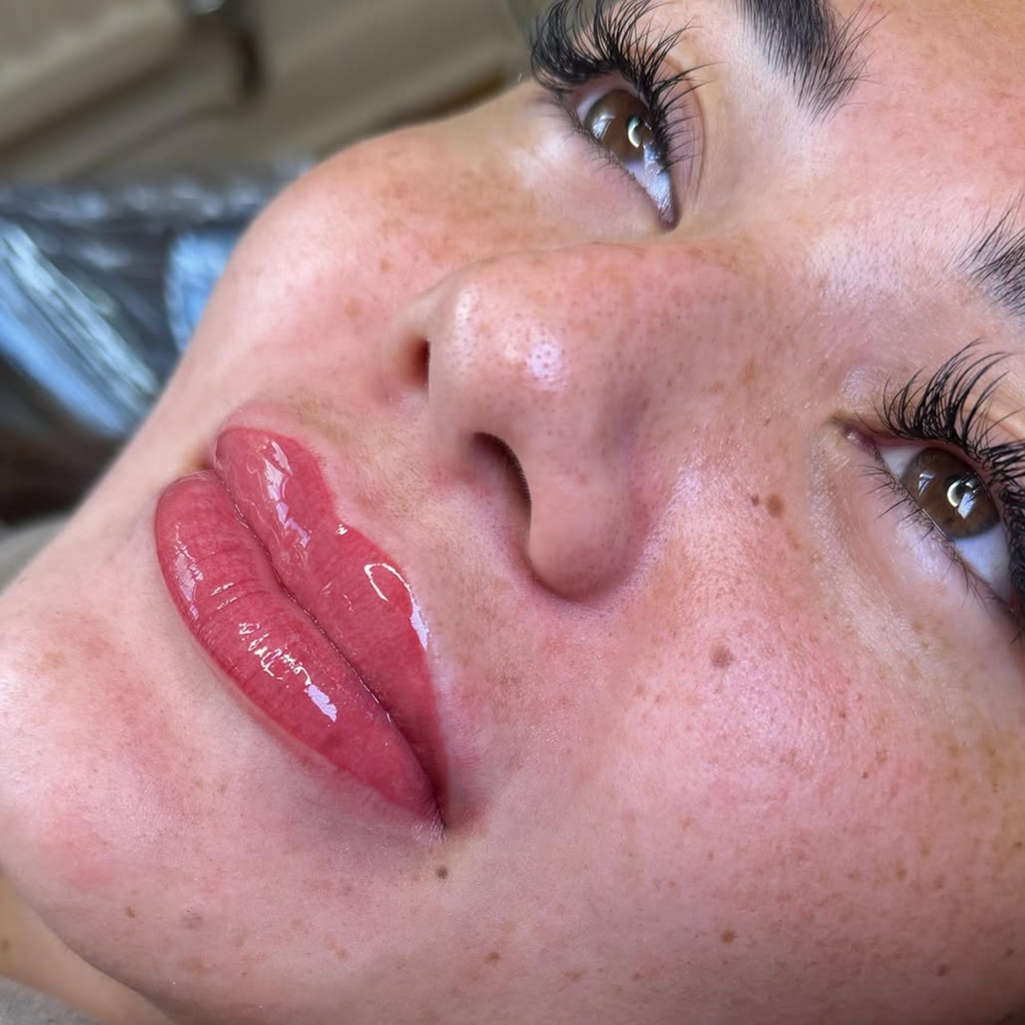 close up healed lip tattoo details
