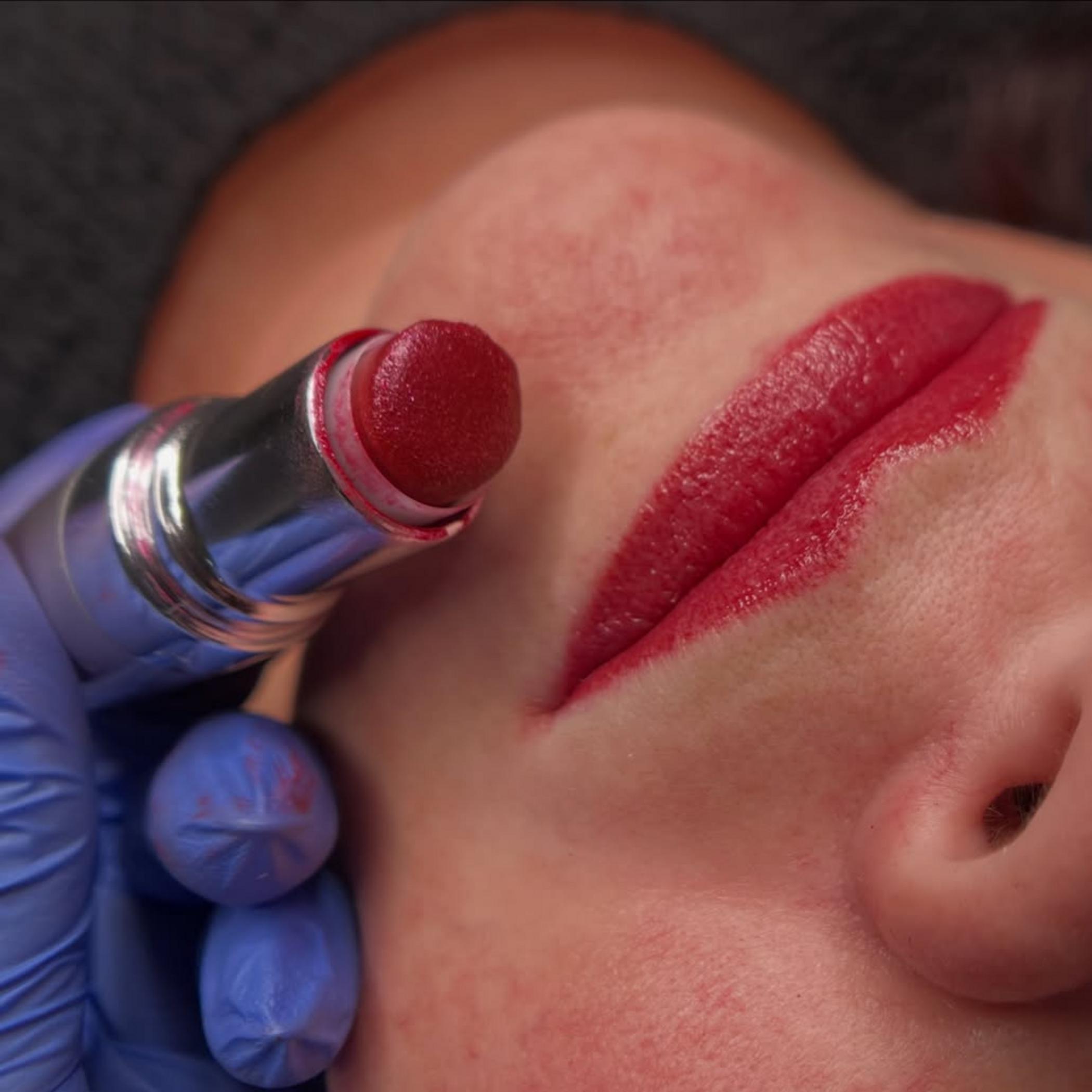 close up swollen lips healing tattoo