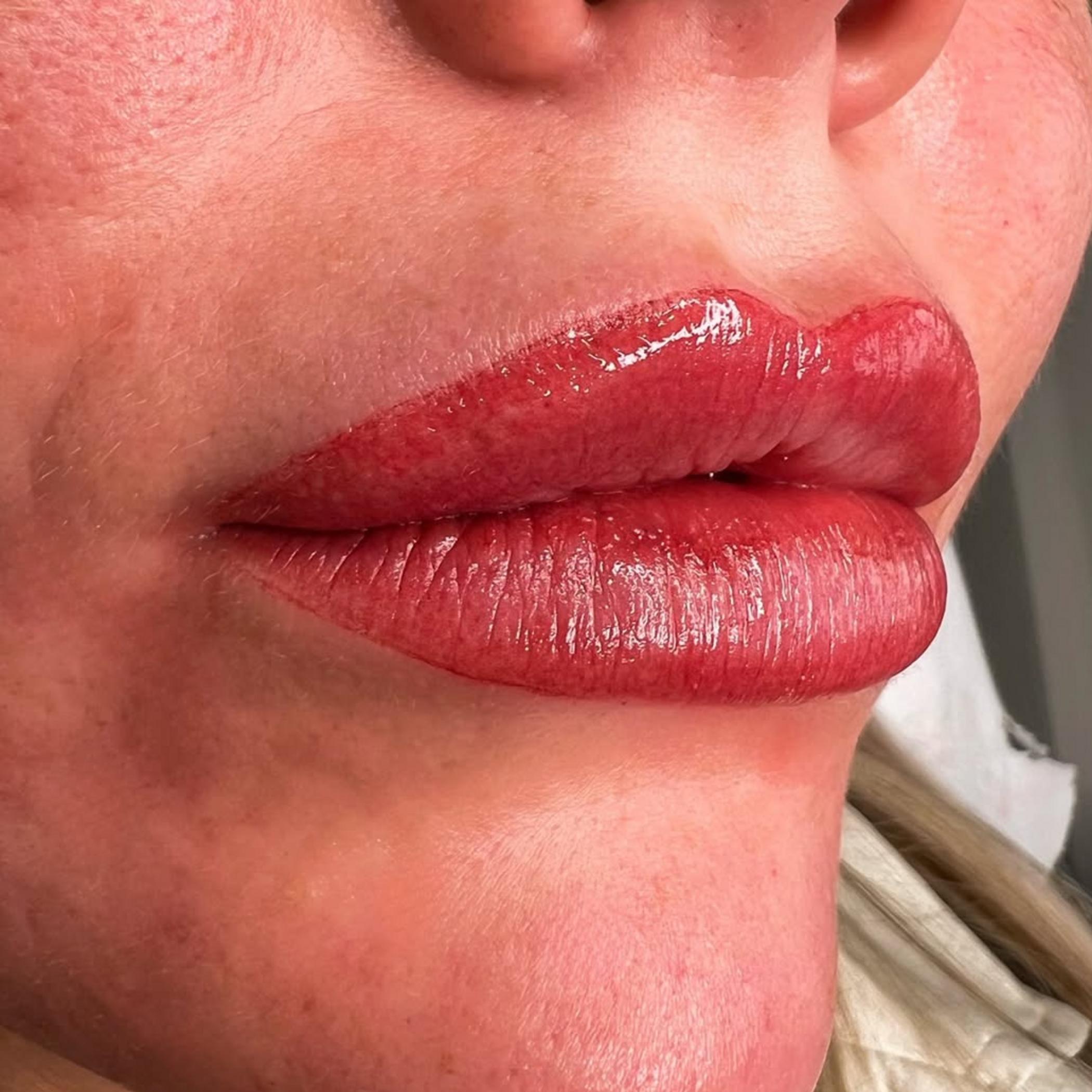 lip liner tattoo procedure in progress