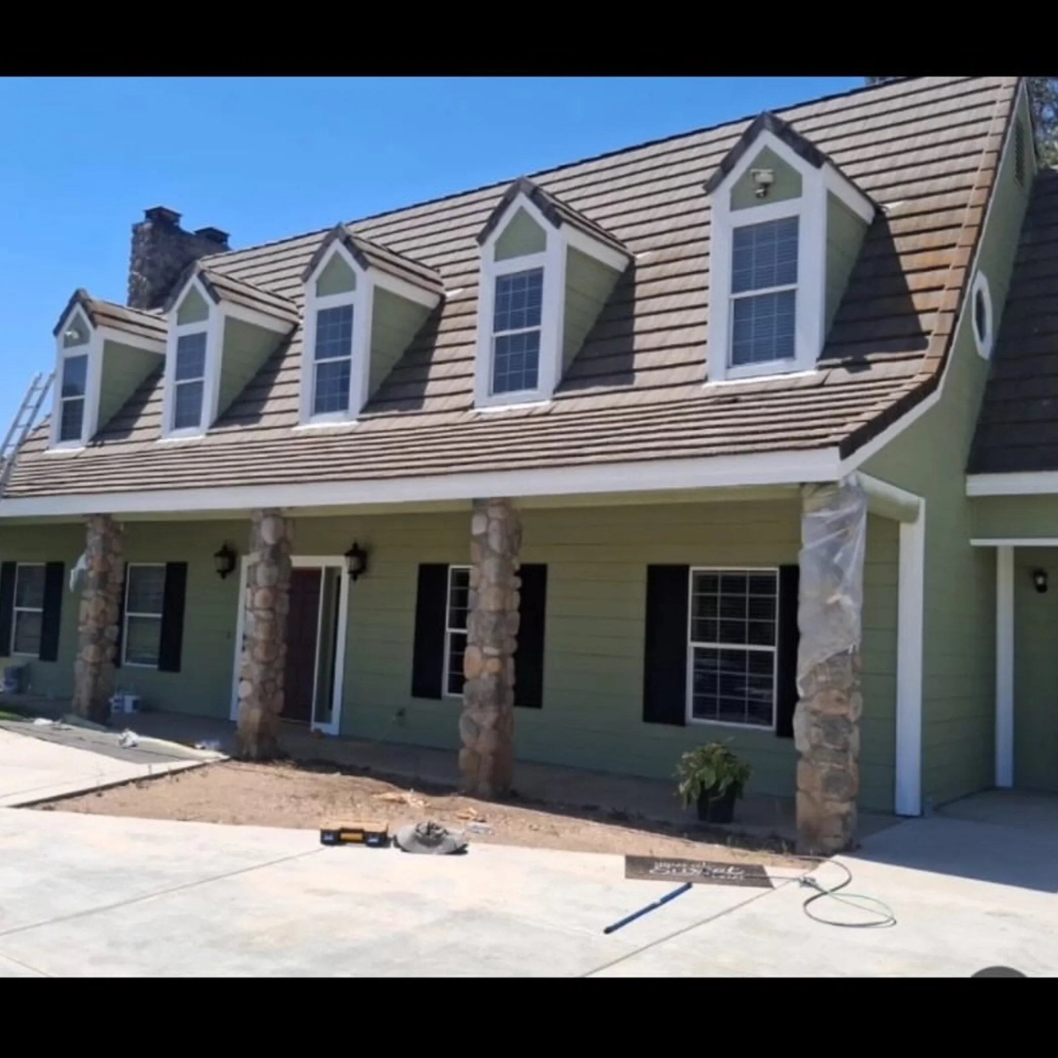 painted house exterior seasonal maintenance